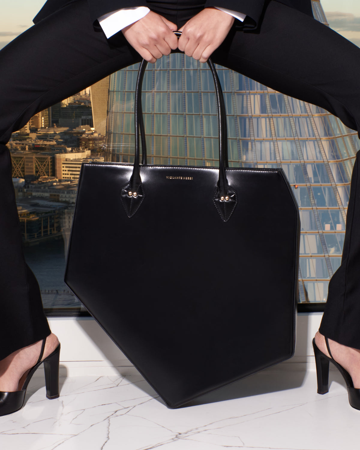 Basma tote bag in sculptural calfskin of structured intent