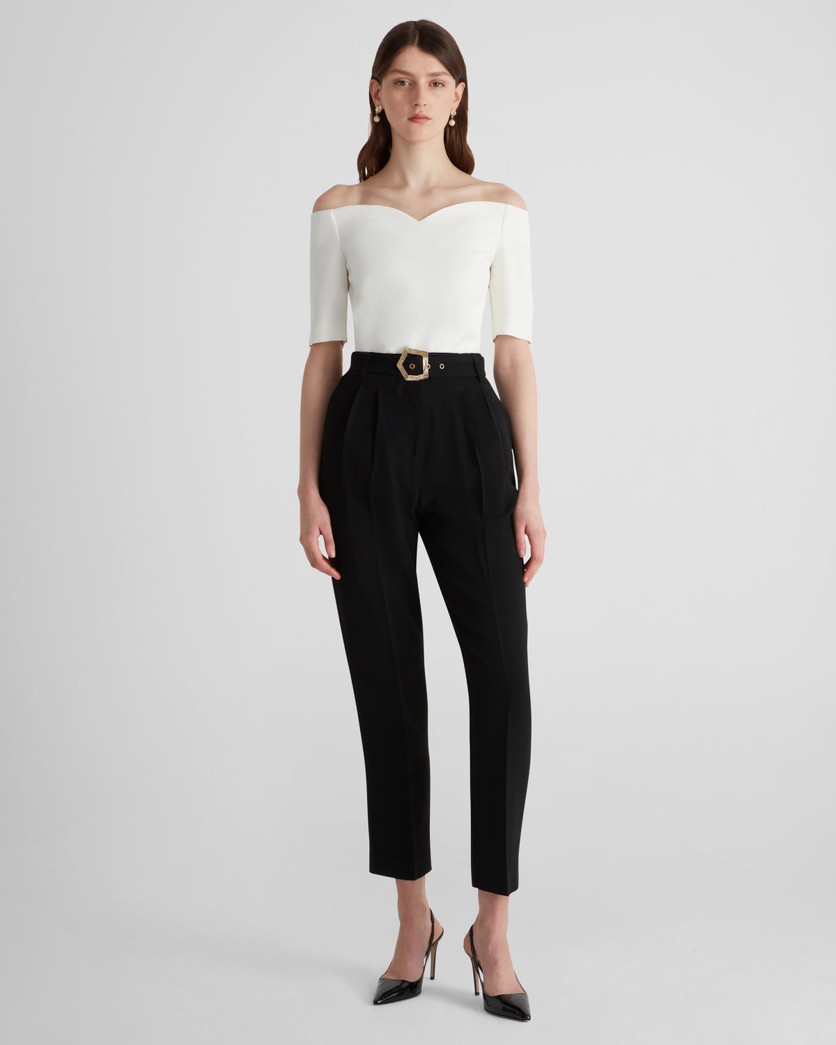 Guttuso trousers with sculptural pleats in a viscose blend