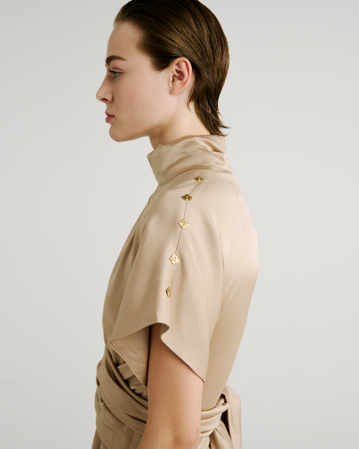 Luminara Dress with a high neckline and fluid drape