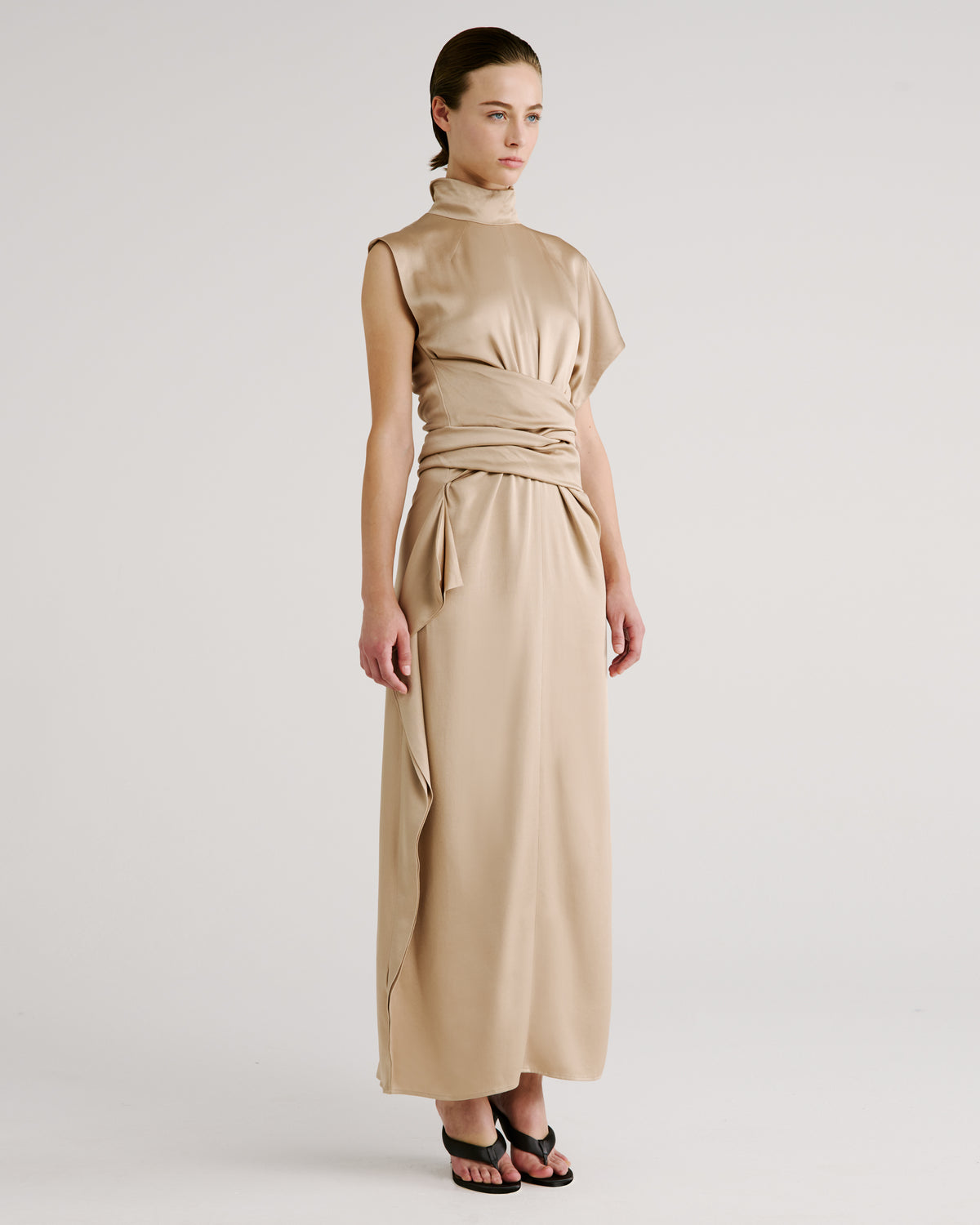 Luminara Dress with a high neckline and fluid drape