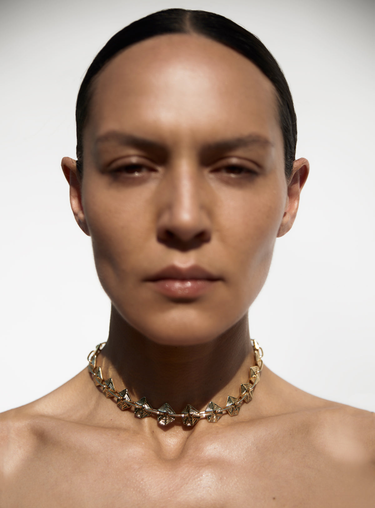 Vera necklace with sculptural engraved brass links