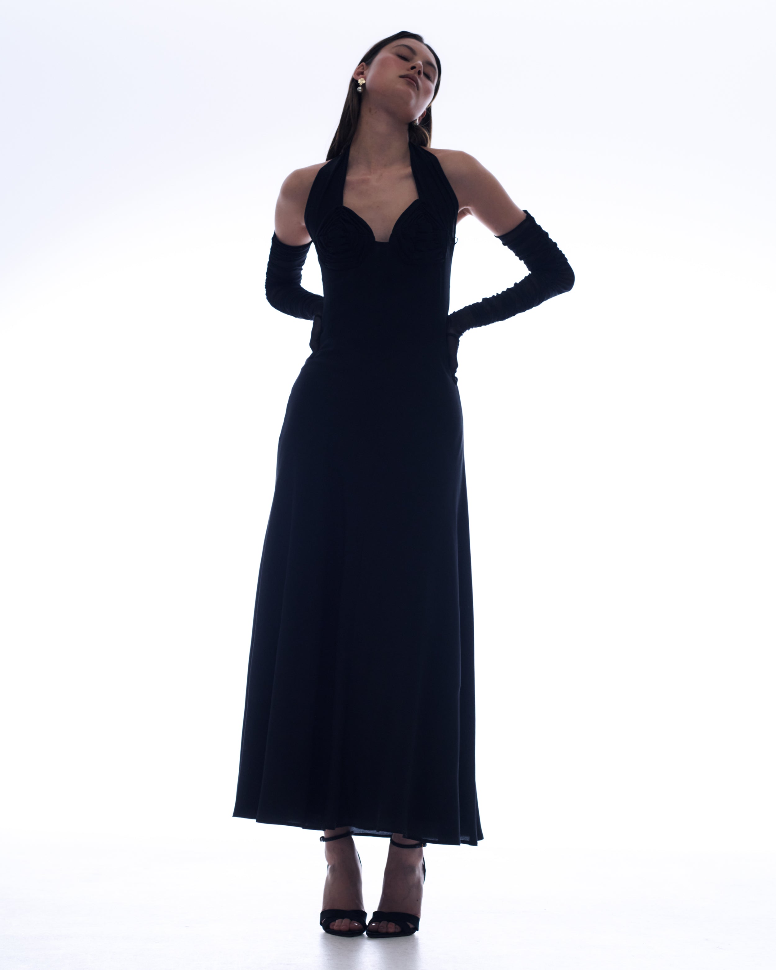 Anya silk dress with a sculptural halterneck and boning