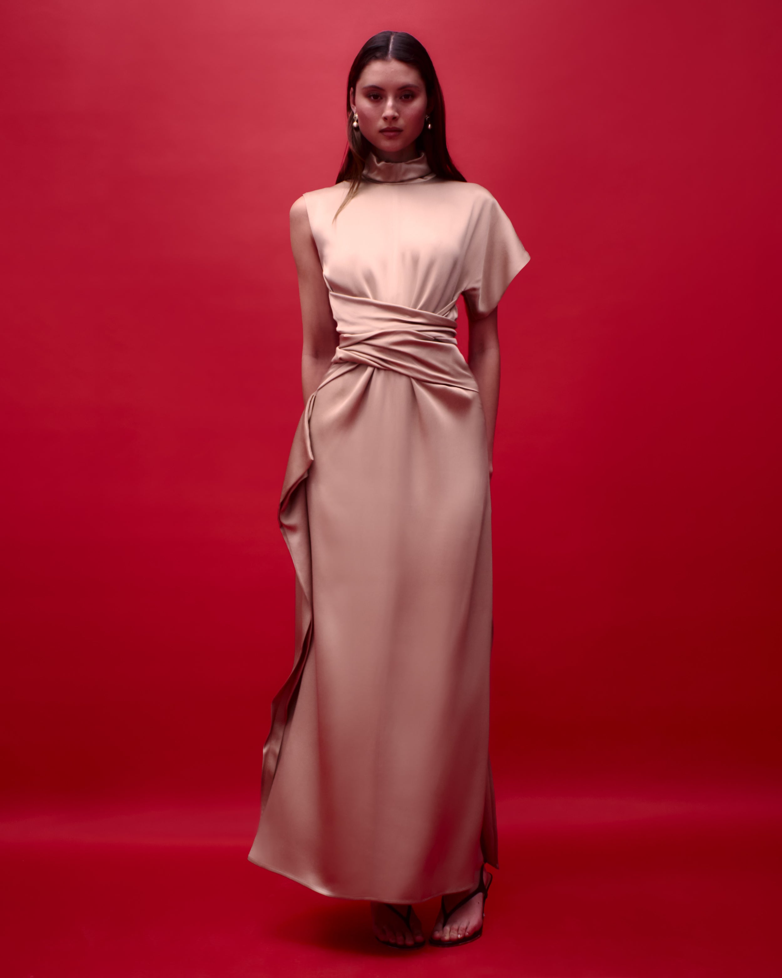 Luminara dress with a high neckline and sculptural drape