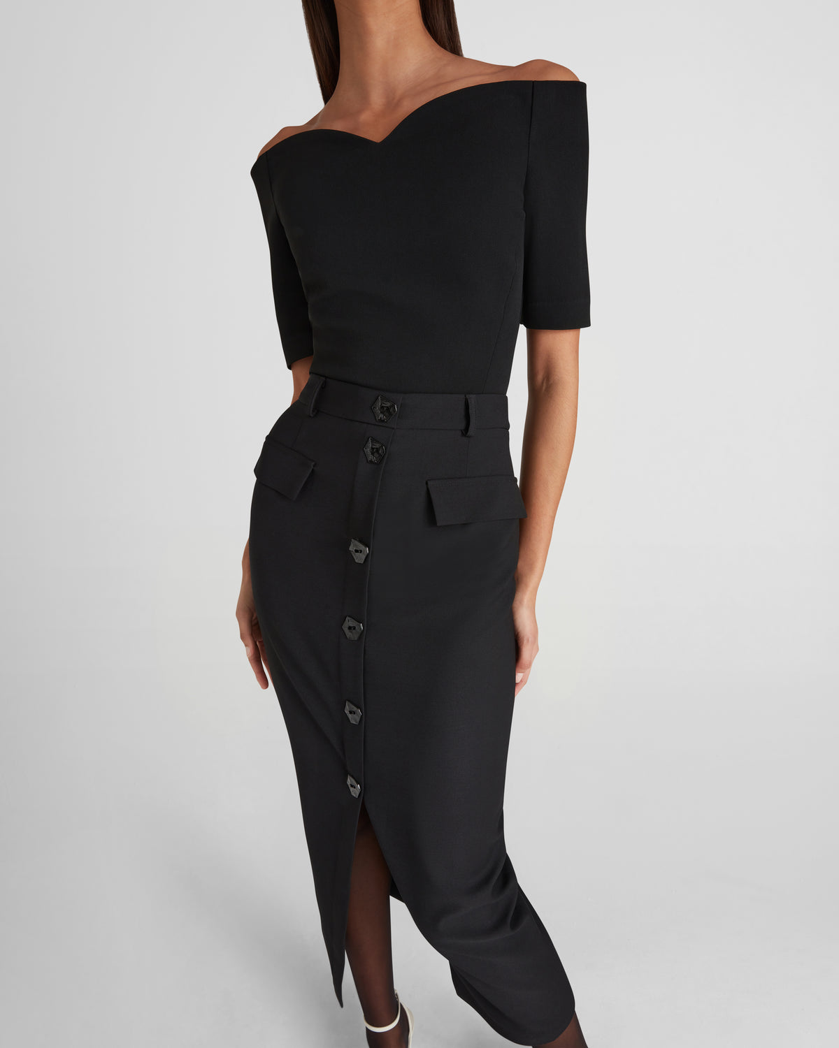 Adassa skirt in pure wool with a slit and intentional form
