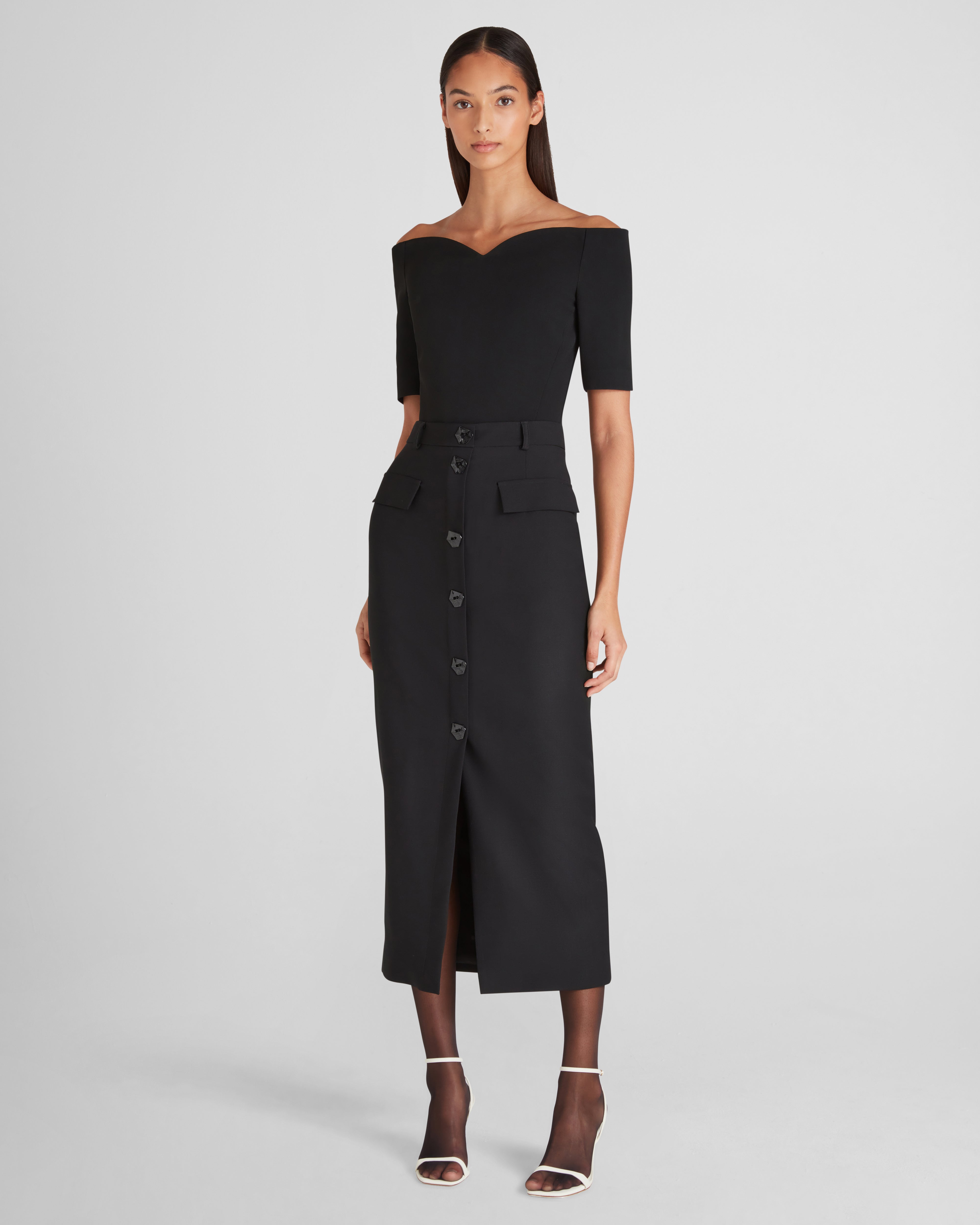 Carrisi top with a sculptural off-the-shoulder neckline