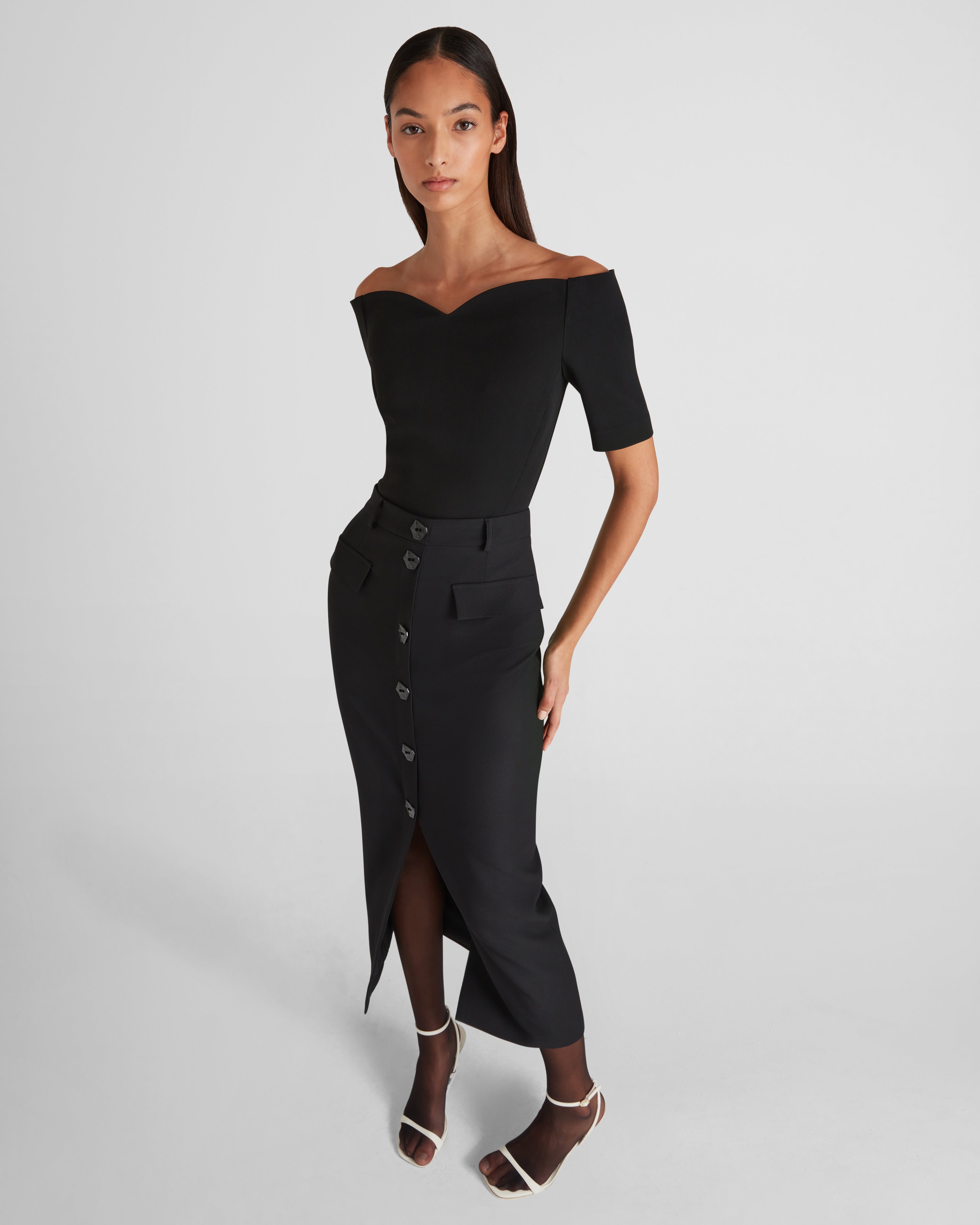 Carrisi top with a sculptural off-the-shoulder neckline