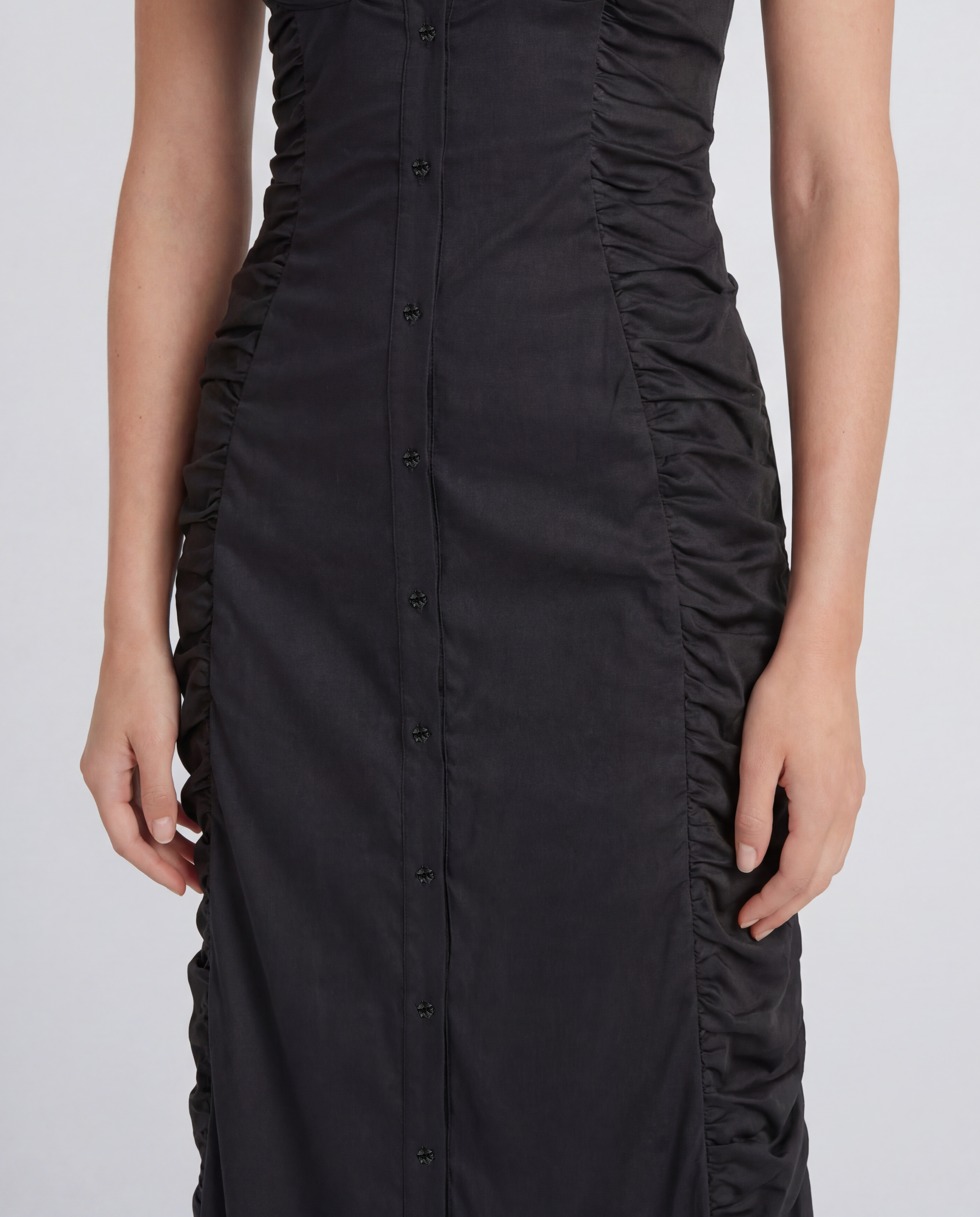 Colony dress in cotton with a sculptural ruched silhouette