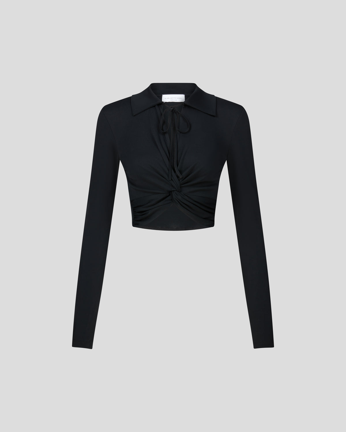 Eiza top in crepe jersey with a sculptural twist front