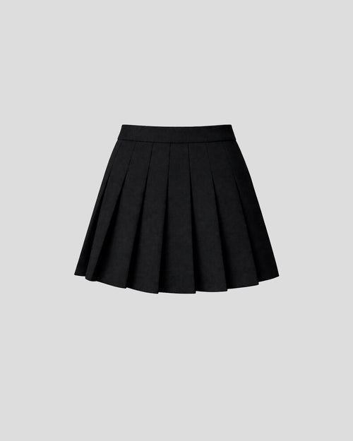 Hovel skort in crepe wool with a sculptural pleated overlay