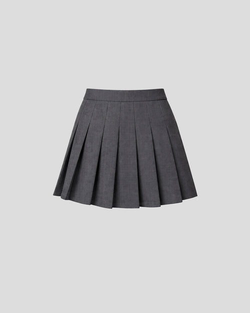 Hovel skort with sculptural pleats in fine crepe wool