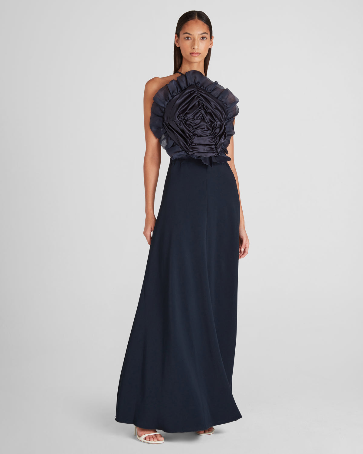June 22nd gown with a sculptural halter and backless form