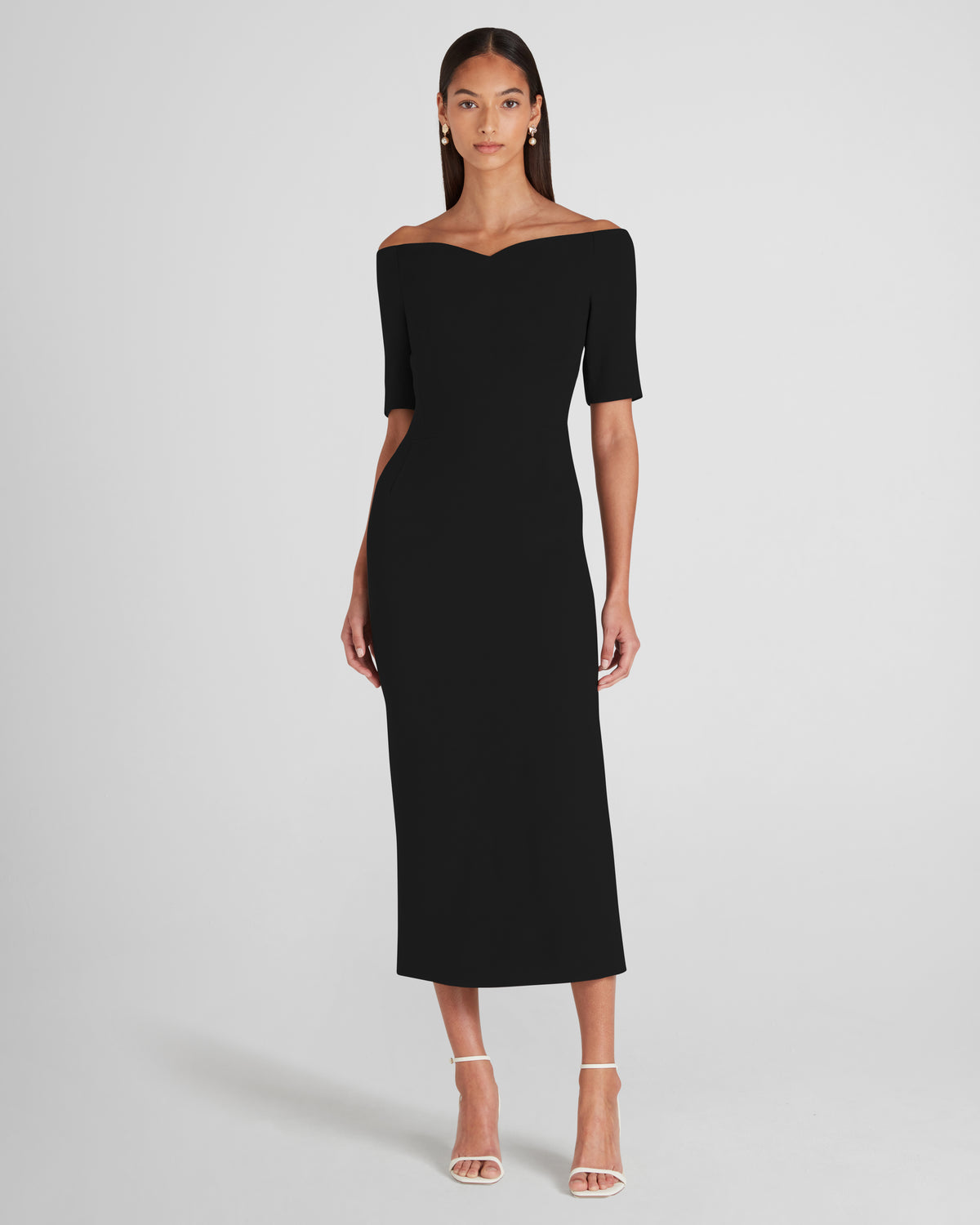Lucretia dress with a sculptural off-the-shoulder neckline