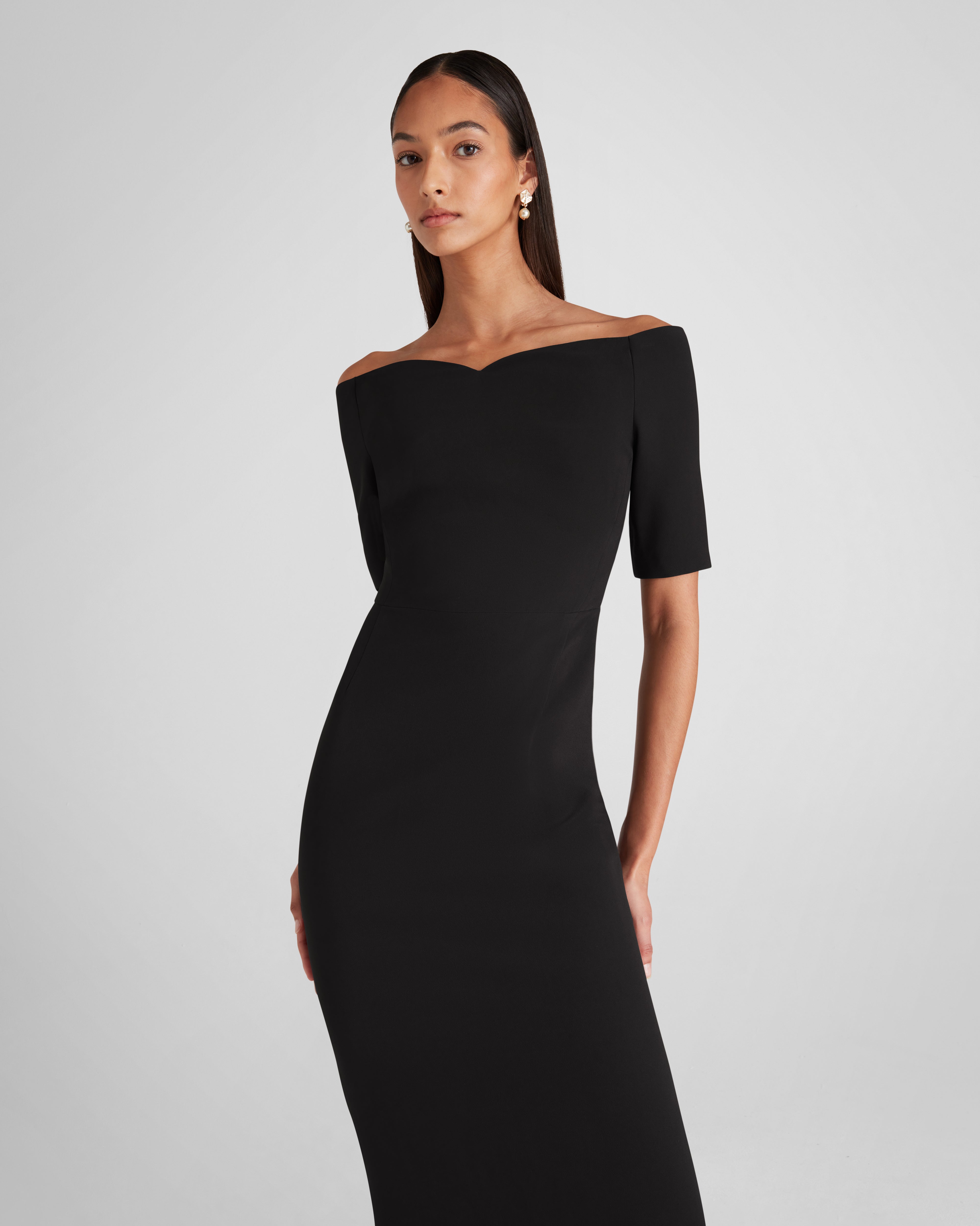 Lucretia dress with a sculptural off-the-shoulder neckline