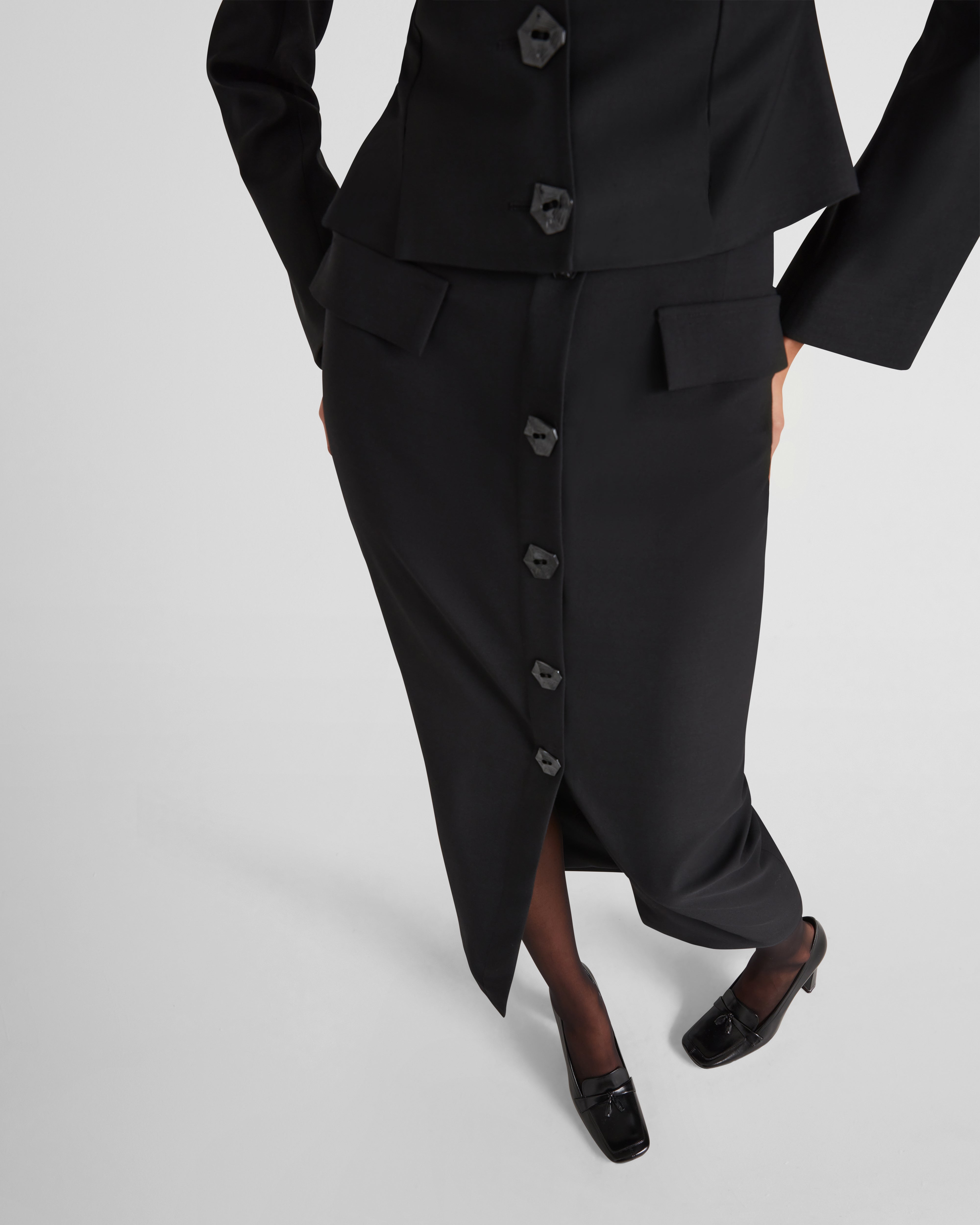 L'Eclaireur blouse in sculptural wool with sweetheart neck