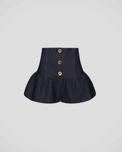 Morocco shorts in organic denim with sculptural peplum