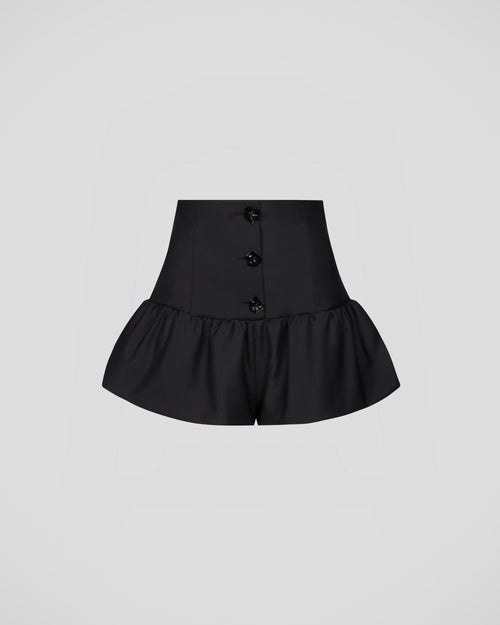 Morocco shorts in crepe wool with a sculptural peplum