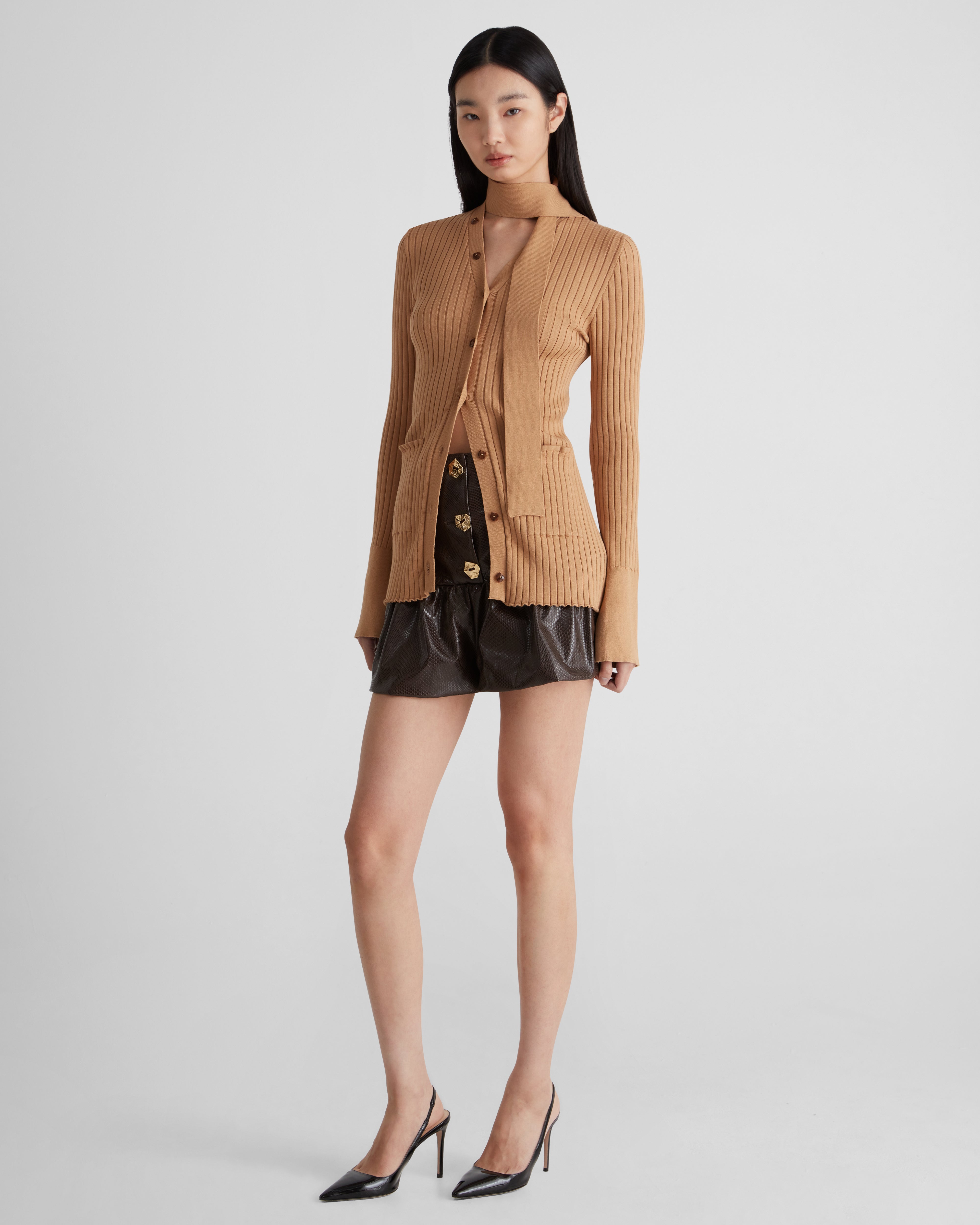 Morocco shorts in snake eco-leather with a flared peplum