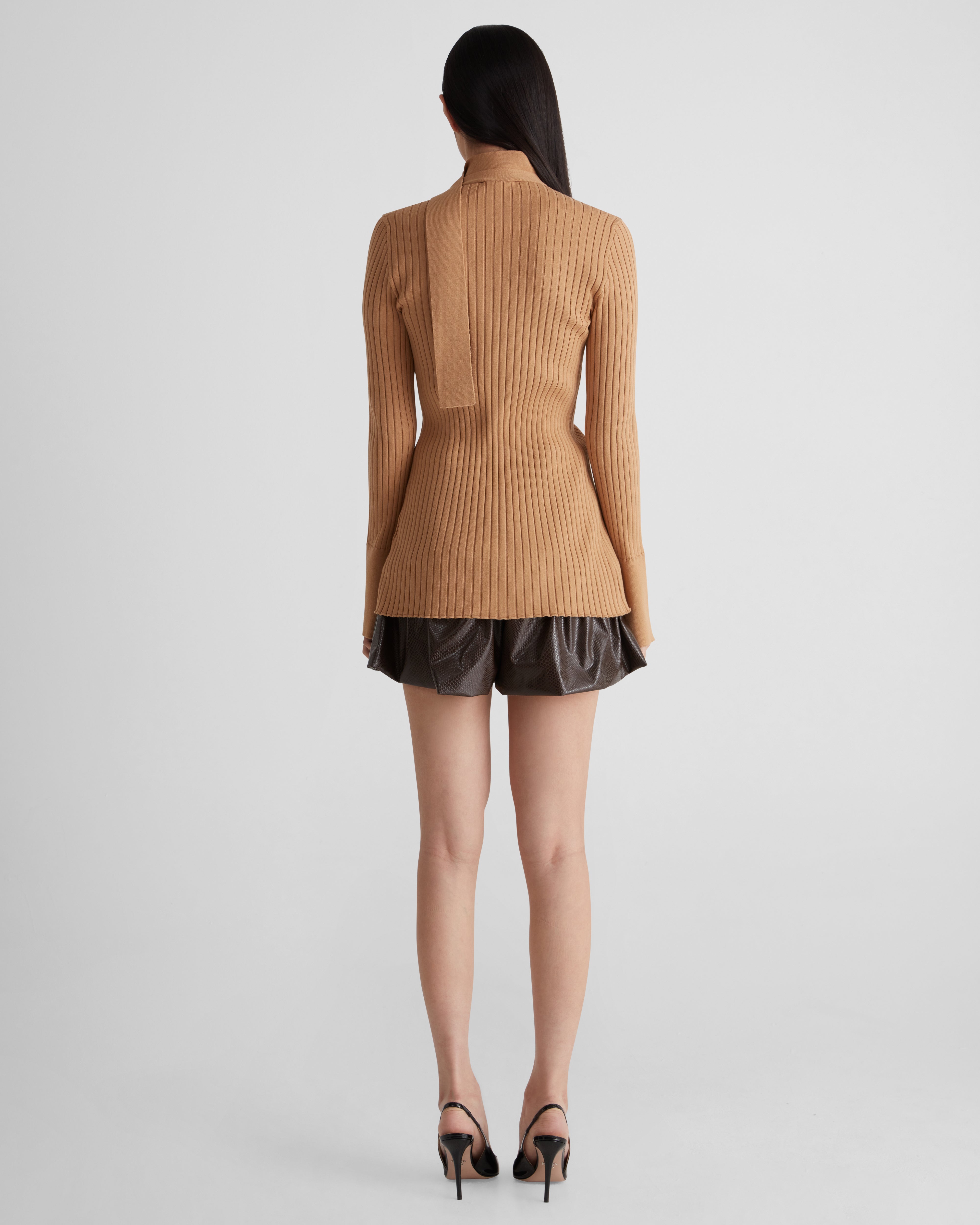 Morocco shorts in snake eco-leather with a flared peplum