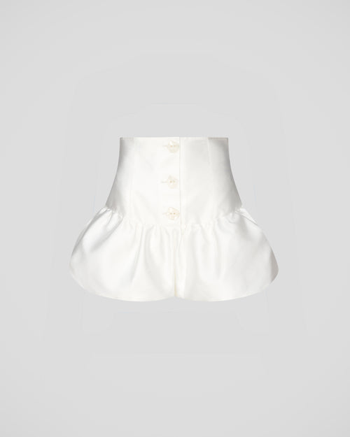 Morocco shorts in sculptural silk mikado with a peplum hem