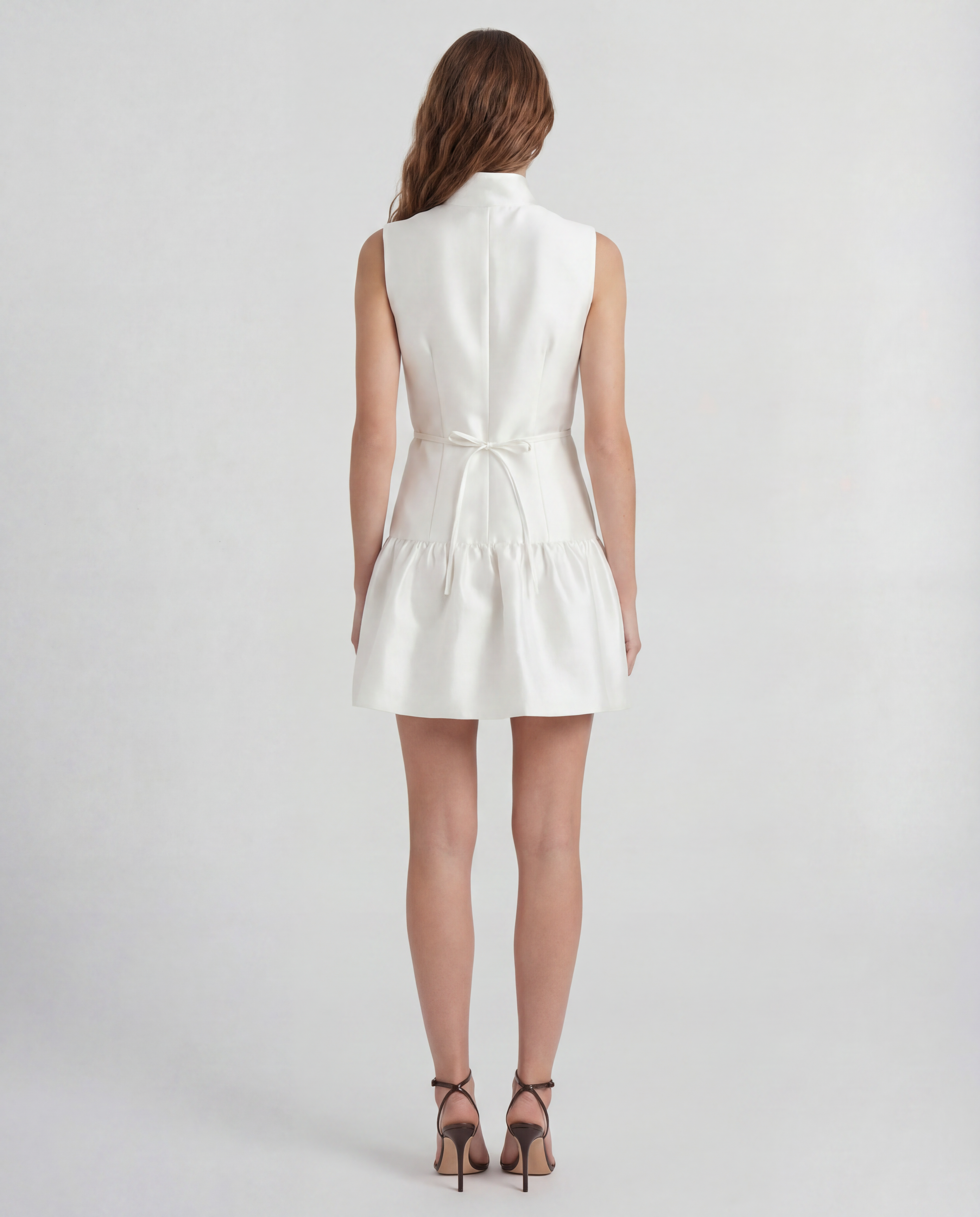 Paris mini dress in silk mikado with a sculptural peplum