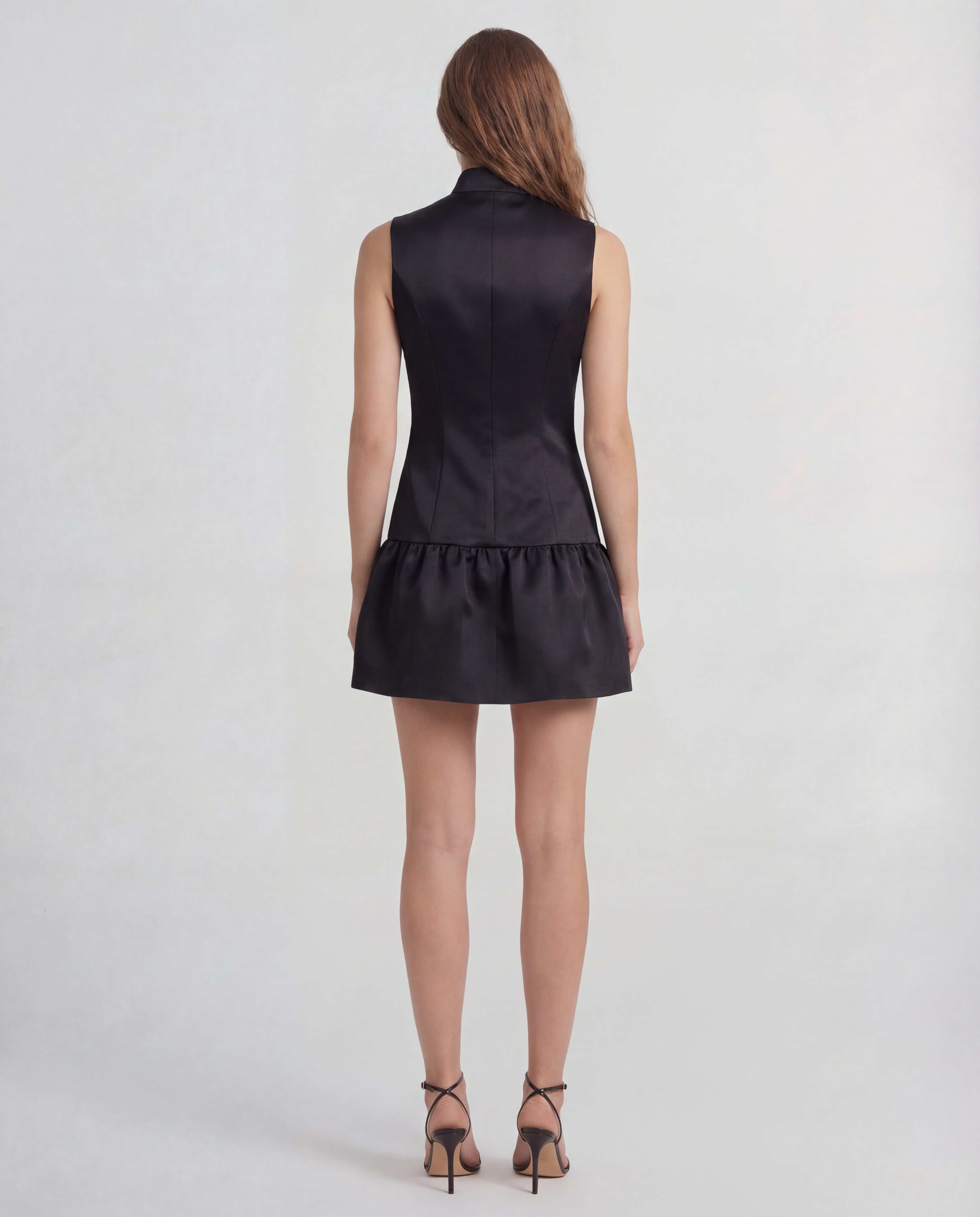 Paris dress in silk mikado with a sculptural peplum hem