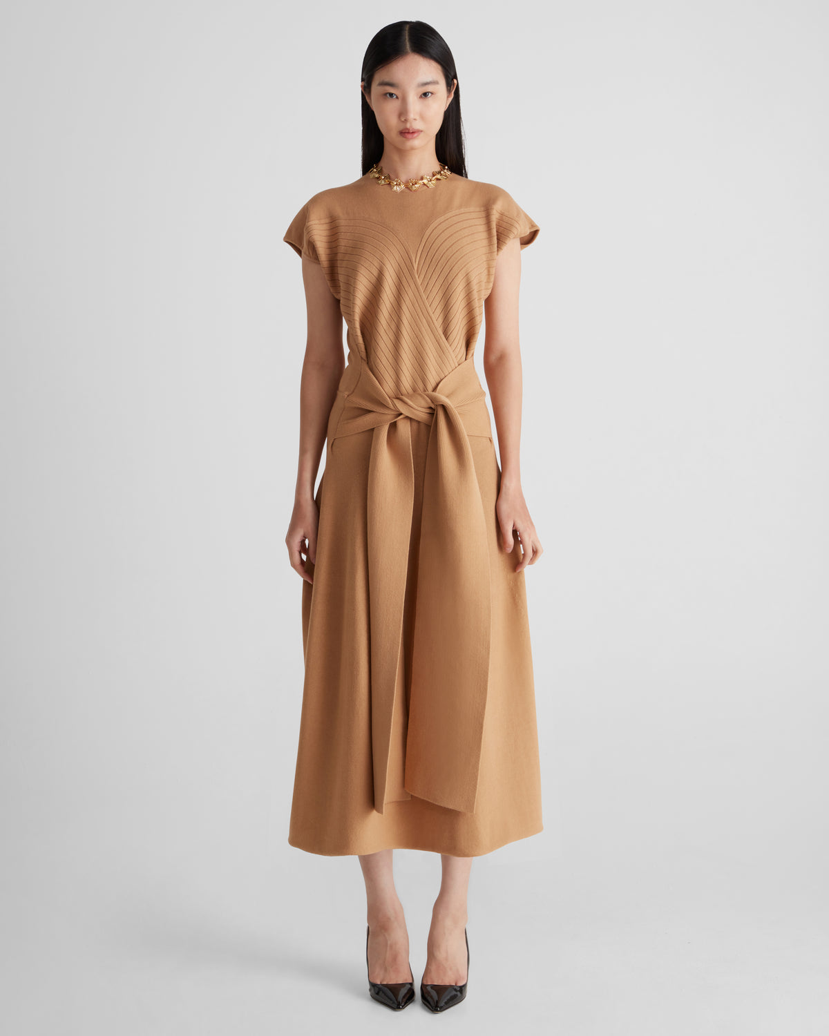 Turrell Knit Dress ribbed bodice sculptural knot